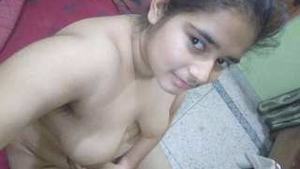 Attractive woman undresses and receives finger stimulation from boyfriend