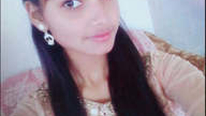 Cute girl records herself naked in a selfie video