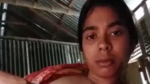Watch a country girl Comilla in a nude solo video