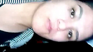 Aroused girlfriend moistures her vagina with her fingers