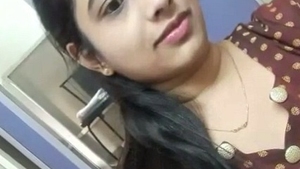 Watch a Desi babe pleasure herself with her fingers in the bathroom