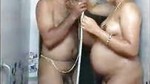 Pregnant lady bath with her husband