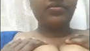 Tamil wife's breasts receive the loving touch from her husband