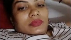 Seductive Indian woman flaunts her large breasts