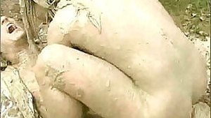 muddy woman attacks and humps guy in the mud