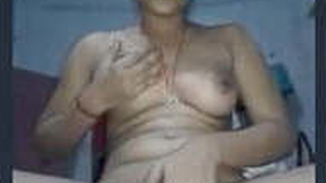 An aroused Indian woman indulges in self-pleasure with her fingers