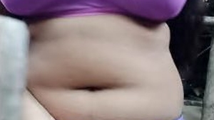 Akhi's breasts and intimate area are highlighted in this sensual video