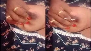 Indian wife flaunts her big boobs in a seductive manner