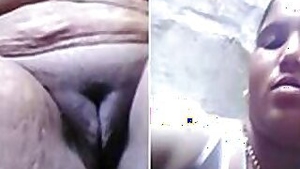 Woman playing with chubby legs savors camera filming her exhibiting XXX twat