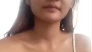 Seductive Asian bhabi pleasuring herself with a bottle