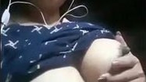 A woman from Manipur reveals her breasts