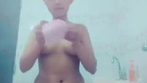 Adorable college girl tapes her menstrual pad and models during her monthly cycle