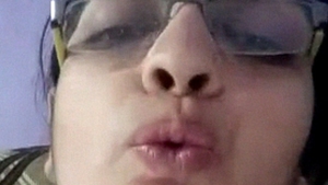 Mature aunt from Kerala enjoys dildo play in solo video