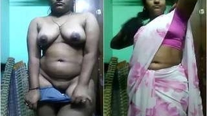 Stunning Desi babe undresses and flaunts her breasts and pussy in HD video