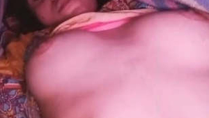 Young Indian girl reveals her virgin breasts in village video