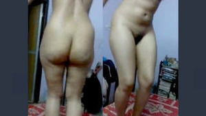 Naked Indian beauty indulges in sensual relaxation