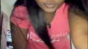 Indian woman covertly taking self-portraits in workplace