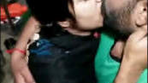 Passionate Punjabi duo engages in a sensual kiss