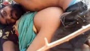 Desi couple engages in outdoor sex in village setting