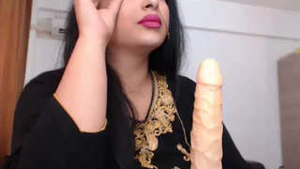 Sensual Indian woman uses dildo for self-pleasure in heated recording