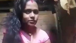 Indian Telugu woman masturbates with dildo