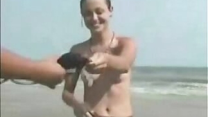 Girl Lost bet had to strip on beach