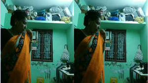 Desi aunty caught changing in secret camera